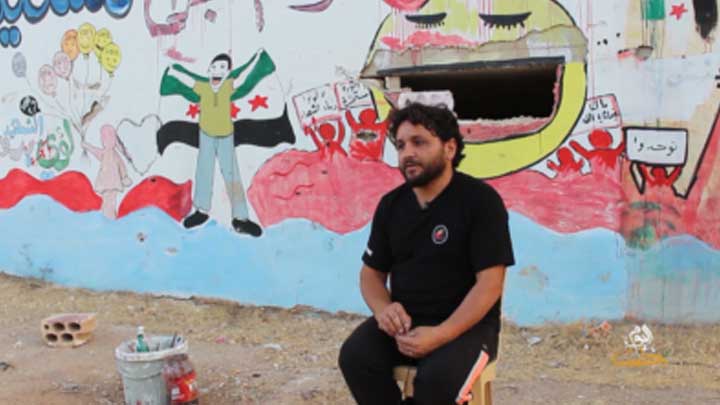 سواعد أمل: فنان سوري يوصل رسالته عن طريق الرسم على الجدران