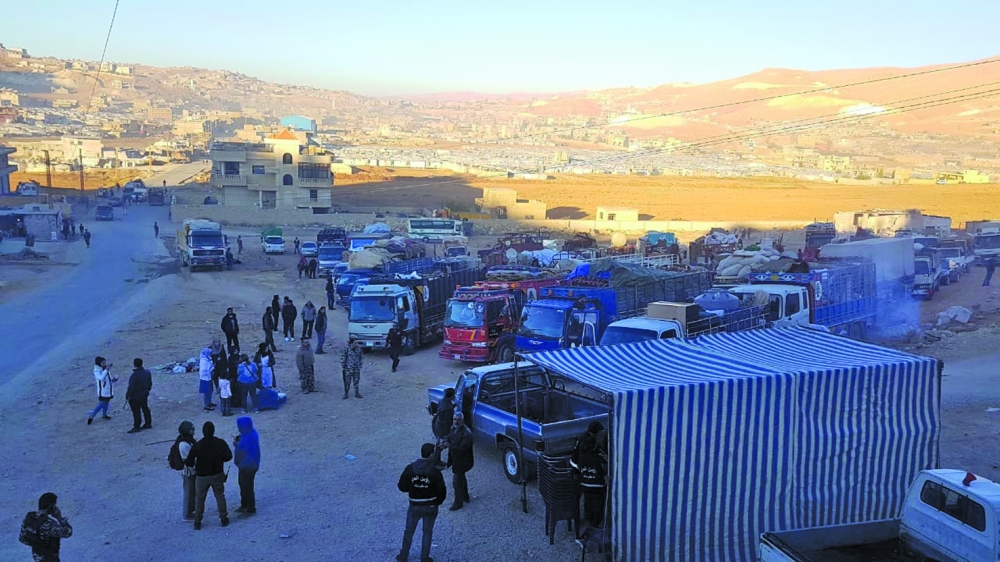 وزير لبناني: نظام الأسد قتلَ نازحين عادوا من لبنان