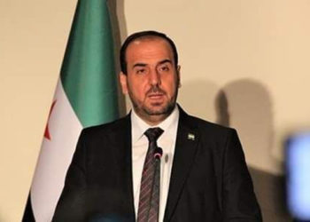 الائتلاف الوطني يطالب العراق بسحب ميليشياته التي تقاتل إلى جانب النظام