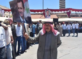 درعا.. النظام يجبر الموظفين على الخروج بمسيرات تأييد لـ”بشار الأسد”