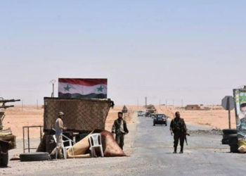 ميليشيا “الدفاع الوطني” تستولي على محال تجارية في الرقة