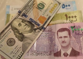 نظام الأسد يستنزف ملايين الدولارات المخصصة للمساعدات من خلال التلاعب بالعملة السورية