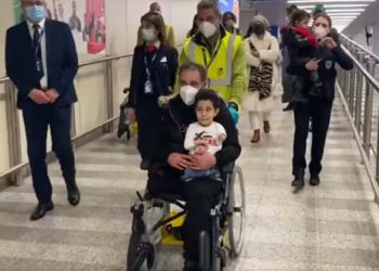 صورة رجل سوري مع ابنه تساهم في منحه حق اللجوء في إيطاليا