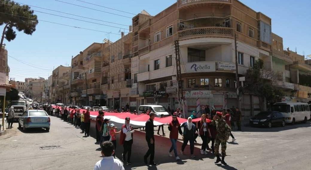 تسويات أمنية تنطلق في القلمون الغربي والنظام يجبر الأهالي على مسيرة مؤيدة