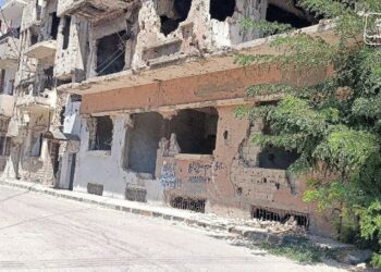 أحد الأحياء المدمرة بقصف الأسد لمدينة حمص - صورة أرشيفية