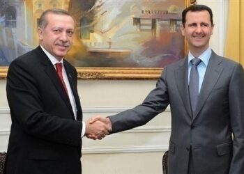 أردوغان يصافح بشار الأسد - أرشيفية